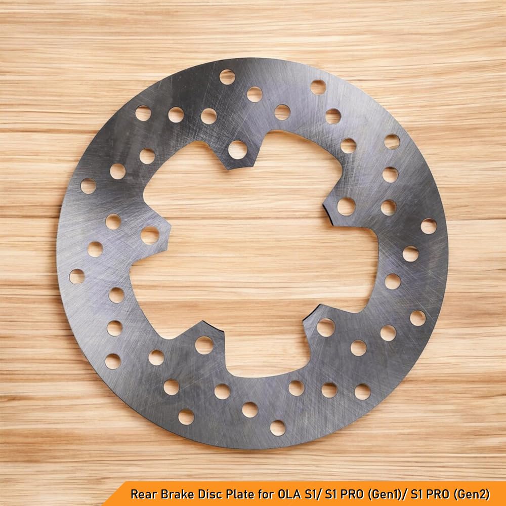 Rear brake disc plate on a wooden surface