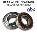 Two rear wheel bearings with text indicating compatibility and brand on a white background